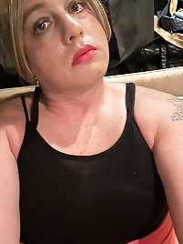 Shemale prostitute is taking off her clothes for money