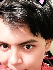 A beautiful shemale in pink stockings is having a good time