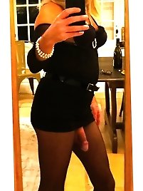 A sissy guy with a huge dick in fishnet pants is very sexy